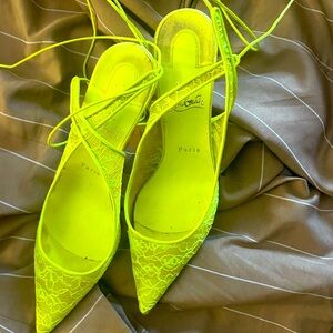 Neon Louboutin lace shoes… extremely comfortable. Good condition